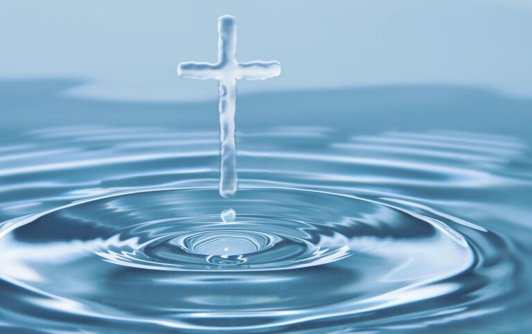 Cross formed by emerging from pool of water, symbolizing Christianity